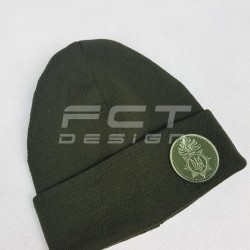 Шапка в'язана з кокардою НГУ хакі