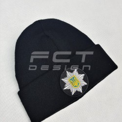 Шапка в'язана з кокардою Поліція