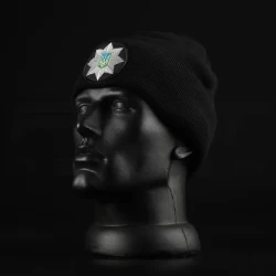 Шапка в'язана з кокардою Поліція