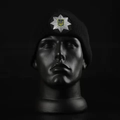 Шапка в'язана з кокардою Поліція