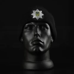 Шапка в'язана з кокардою Поліція