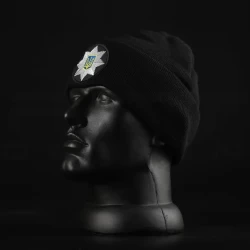Шапка в'язана з кокардою Поліція